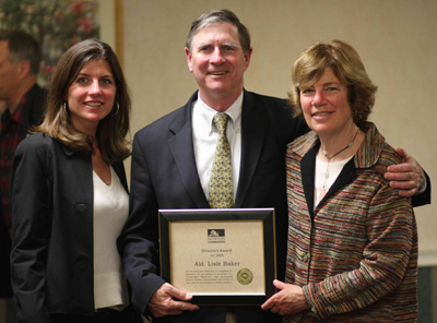 Lisle with his wife Sally and daughter, Mary Sarah with his Directors' Award from the Newton Conservators in 2009